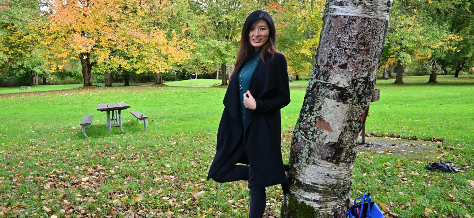 Sixu Chen in a leafy park